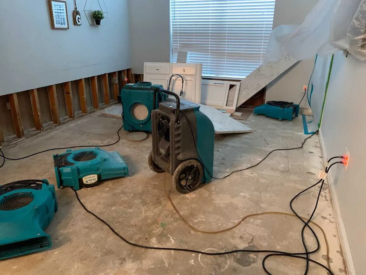 Dehumidifier in flood-cut room for Water Damage Restoration in Cortez